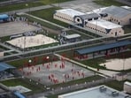 At a Miami immigration detention center, migrants were held in cells for hours without lunch and remained shackled while eating around 7 p.m. At a Miami immigration detention center, migrants were held in cells for hours without lunch and remained shackled while eating around 7 p.m.