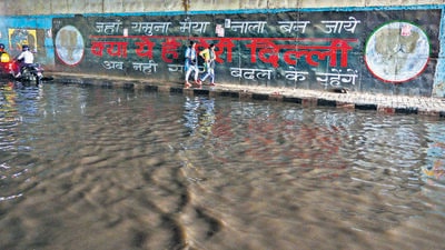 A waterlogged stretch after heavy rainfall at Pandav Nagar underpass in New Delhi on Tuesday. (RAJ K RAJ /HT PHOTO)