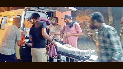 An injured being rushed to civil hospital, Khanna after a vehicle carrying wedding guests and a tractor trolley collided near Khanna on Monday night. (HT Photo) An injured being rushed to civil hospital, Khanna after a vehicle carrying wedding guests and a tractor trolley collided near Khanna on Monday night. (HT Photo)