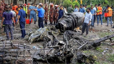 A Bangladeshi training fighter jet crashed into a school in the capital Dhaka on July 21, killing at least 27 people and injuring dozens more in the country's deadliest aviation accident in decades. Bangladesh's fire service and security personnel conduct a search and rescue operation at the crash site. (AFP) A Bangladeshi training fighter jet crashed into a school in the capital Dhaka on July 21, killing at least 27 people and injuring dozens more in the country's deadliest aviation accident in decades. Bangladesh's fire service and security personnel conduct a search and rescue operation at the crash site. (AFP)