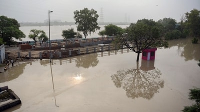 According to the Central Water Commission (CWC), the peak discharge touched 54,707 cusecs at 1 AM on Tuesday. (ANI) According to the Central Water Commission (CWC), the peak discharge touched 54,707 cusecs at 1 AM on Tuesday. (ANI)