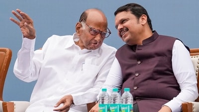 In his article, Sharad Pawar lauded Devendra Fadnavis's energy and commitment to public service. (PTI) In his article, Sharad Pawar lauded Devendra Fadnavis's energy and commitment to public service. (PTI)
