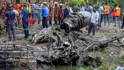 Bangladesh's fire service and security personnel conduct a search and rescue operation after an Air Force training jet crashed into a school in Dhaka on July 21, 2025. A Bangladeshi training fighter jet crashed into a school in the capital Dhaka on July 21, killing at least 19 people and injuring dozens more in the country's deadliest aviation accident in decades. (AFP) Bangladesh's fire service and security personnel conduct a search and rescue operation after an Air Force training jet crashed into a school in Dhaka on July 21, 2025. A Bangladeshi training fighter jet crashed into a school in the capital Dhaka on July 21, killing at least 19 people and injuring dozens more in the country's deadliest aviation accident in decades. (AFP)