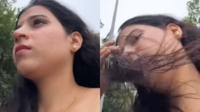 Woman fell off a two-wheeler during a Rapido ride while filming; clip went viral. (Instagram/bhangrabypahadan)