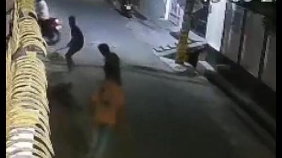 A CCTV grab purportedly showing three of the accused striking Manoj near Kalyanpur. (Sourced)