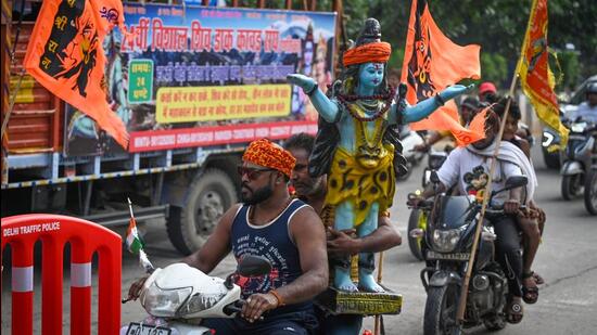 Kanwariyas near Kashmere Gate on Tuesday. (Sanchit Khanna/HT Photo)