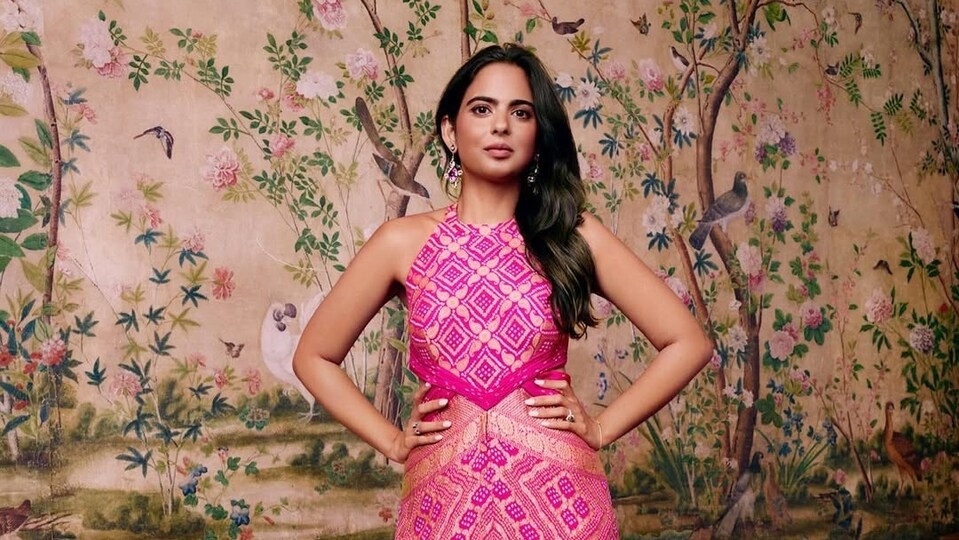 isha ambani pink dress Isha Ambani in unique pink Bandhani gown by Roberto Cavalli is a stunning  blend of Indian and Italian fashion. See pics