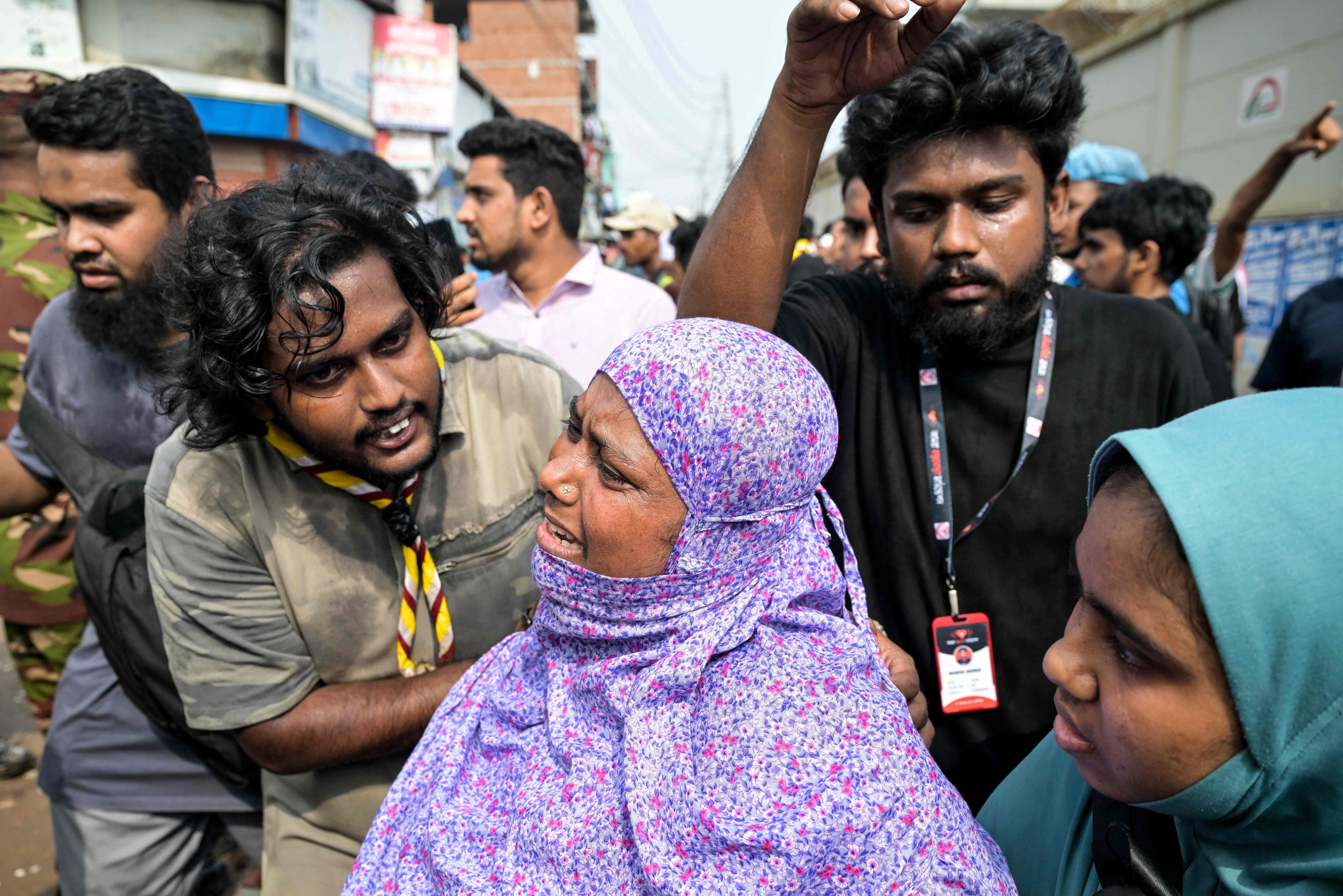 The mother of a student cries outside a school where an Air Force training jet crashed in Dhaka on July 21, 2025. (AFP) The mother of a student cries outside a school where an Air Force training jet crashed in Dhaka on July 21, 2025. (AFP)