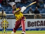 Andre Russell of West Indies hits a four during his last international match Andre Russell of West Indies hits a four during his last international match
