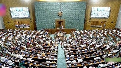 Members of Parliament while voting on clauses of the women's reservation bill on demand of an Opposition MP in Lok Sabha during the Special Session of Parliament in New Delhi on Wednesday. (ANI) Members of Parliament while voting on clauses of the women's reservation bill on demand of an Opposition MP in Lok Sabha during the Special Session of Parliament in New Delhi on Wednesday. (ANI)