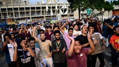 Students shout slogans during a protest near secretariat against the crash of a Bangladesh air force training jet into a school, demanding accountability, compensation for victims' families and the halt of training flights, in Dhaka, Bangladesh, (AP)