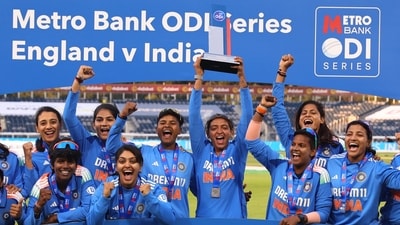 India's Harmanpreet Kaur lifts the trophy as she celebrates with teammates after winning the Women's One Day International (Action Images via Reuters)