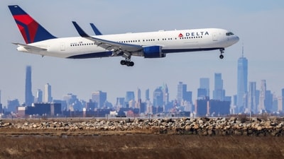 The Delta pilots stopped the takeoff and returned the plane to the terminal after another plane nearly landed on top of it in Mexico. (Representative image) (AFP) The Delta pilots stopped the takeoff and returned the plane to the terminal after another plane nearly landed on top of it in Mexico. (Representative image) (AFP)