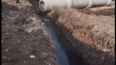 The black sludge from a network pipeline leads into a culvert before ultimately leading to the Aravallis, locals said. (HT Photo) The black sludge from a network pipeline leads into a culvert before ultimately leading to the Aravallis, locals said. (HT Photo)