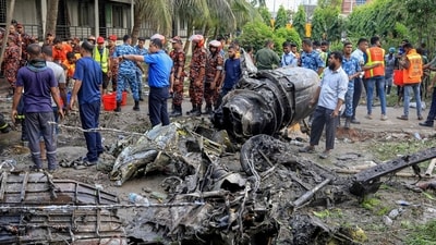 A Bangladeshi training fighter jet crashed just minutes after take off at 1.06 pm (local time) on Monday. (AFP) A Bangladeshi training fighter jet crashed just minutes after take off at 1.06 pm (local time) on Monday. (AFP)