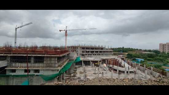 The construction of the Pimpri Chinchwad Municipal Corporation’s (PCMC) upcoming 700-bed general hospital at Moshi is moving forward rapidly, with the structure now completed up to the third floor. (HT)