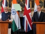 Britain's Prime Minister Keir Starmer and Prime Minister Narendra Modi of India speak during a press conference after signing a free trade agreement at Chequers near Aylesbury, England, Thursday, July 24, 2025. 
