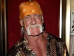 Wrestler and body builder Hulk Hogan poses for photographers after arriving for the US premiere of the film "War of the Worlds,"