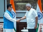 Jagdeep Dhankar with Kiren Rijiju during a meeting in New Delhi.