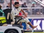 India's Rishabh Pant grimaces in pain as he is being taken off the field. India's Rishabh Pant grimaces in pain as he is being taken off the field.