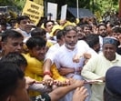 Patna police detain Jan Suraaj Party president Prashant Kishor and his supporters during a demonstration in Patna on July 23. (Santosh Kumar/ HT Photo) Patna police detain Jan Suraaj Party president Prashant Kishor and his supporters during a demonstration in Patna on July 23. (Santosh Kumar/ HT Photo)