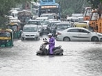 Commuters seen wading through heavily waterlogged stretch over Rohtak Road in New Delhi Commuters seen wading through heavily waterlogged stretch over Rohtak Road in New Delhi