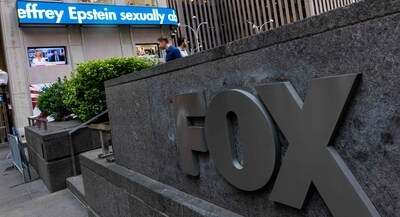 The latest news is displayed outside of the News Corporation building in midtown Manhattan, which houses both the Wall Street Journal, Fox News, and Dow Jones & Co., on July 22, 2025, in New York City. (AFP) The latest news is displayed outside of the News Corporation building in midtown Manhattan, which houses both the Wall Street Journal, Fox News, and Dow Jones & Co., on July 22, 2025, in New York City. (AFP)