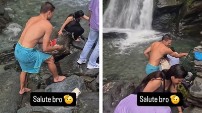 A video shows a foreign tourist picking up trash in Himachal Pradesh (X/@iNikhilsaini) A video shows a foreign tourist picking up trash in Himachal Pradesh (X/@iNikhilsaini)