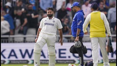 India's Rishabh Pant grimaces in pain after an injury on day one of the fourth test cricket match between India and England. (PTI) India's Rishabh Pant grimaces in pain after an injury on day one of the fourth test cricket match between India and England. (PTI)