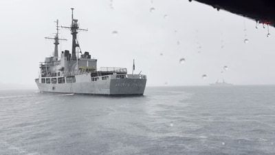 (Reprsentational image) The USS Fitzgerald allegedly encountered an Iranian helicopter in international waters, with each side presenting differing accounts of the event. (Photo by Ted ALJIBE / AFP) (AFP) (Reprsentational image) The USS Fitzgerald allegedly encountered an Iranian helicopter in international waters, with each side presenting differing accounts of the event. (Photo by Ted ALJIBE / AFP) (AFP)