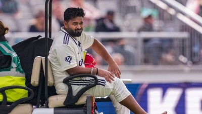 Manchester: India's Rishabh Pant grimaces in pain as he is being taken off field after an injury on day one of the fourth Test (PTI) Manchester: India's Rishabh Pant grimaces in pain as he is being taken off field after an injury on day one of the fourth Test (PTI)