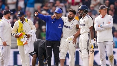 India's Rishabh Pant being assisted by a physio after an injury on day one of the fourth test cricket match between India and England, at Old Trafford (PTI) India's Rishabh Pant being assisted by a physio after an injury on day one of the fourth test cricket match between India and England, at Old Trafford (PTI)