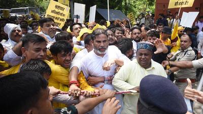 Patna police detain Jan Suraaj Party president Prashant Kishor and his supporters during a demonstration in Patna on July 23. (Santosh Kumar/ HT Photo) Patna police detain Jan Suraaj Party president Prashant Kishor and his supporters during a demonstration in Patna on July 23. (Santosh Kumar/ HT Photo)