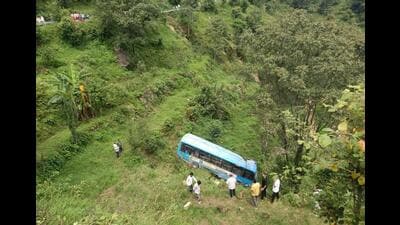 The HRTC bus that skidded and rolled down a hill at Sarkaghat in Mandi district on Thursday. (HT Photo)