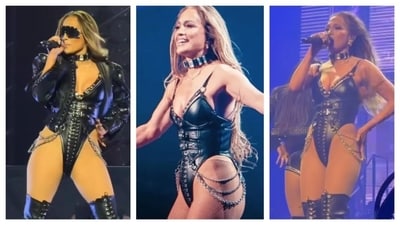 Another bodysuit, but this one has a pure punk, rockstar baddie design. While the silver bodysuit exuded classic pop diva glam, this one takes a darker edge with the metallic chains, black faux-leather corset, plunging neckline and choker. This bodysuit's design is very structured and looks unapologetically fierce. (PC: Instagram/ Jennifer Lopez ) Another bodysuit, but this one has a pure punk, rockstar baddie design. While the silver bodysuit exuded classic pop diva glam, this one takes a darker edge with the metallic chains, black faux-leather corset, plunging neckline and choker. This bodysuit's design is very structured and looks unapologetically fierce. (PC: Instagram/ Jennifer Lopez )
