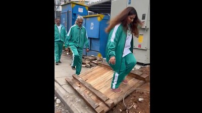 Bengaluru residents dressed up like "Squid Game" characters and enacted a scene while navigating the supposedly dangerous footpaths of Bengaluru, to highlight civic apathy and substandard infrastructure in the tech hub. (X) Bengaluru residents dressed up like "Squid Game" characters and enacted a scene while navigating the supposedly dangerous footpaths of Bengaluru, to highlight civic apathy and substandard infrastructure in the tech hub. (X)