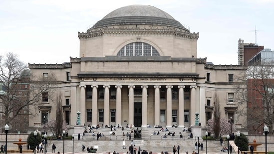 Students are seen on the campus of Columbia University in New York City, April 2025 . The university would pay $221 million in all to settle probes launched by Trump administration over claims of anti-semitism on campus, particularly surrounding pro-Palestinian protests last year. (AFP)