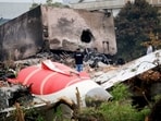 A firefighter stands next to the crashed Air India Boeing 787-8 Dreamliner aircraft, in Ahmedabad, India, June 13, 2025.