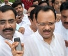 NCP-leader-Ajit-Pawar-with-party-leaders-after-a-meeting-in-Mumbai-on-Friday-PTI-Santosh-Hirlekar NCP-leader-Ajit-Pawar-with-party-leaders-after-a-meeting-in-Mumbai-on-Friday-PTI-Santosh-Hirlekar