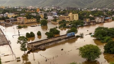 A flooded residential area after heavy monsoon showers in Pushkar, Rajasthan, on July 20. (PTI) A flooded residential area after heavy monsoon showers in Pushkar, Rajasthan, on July 20. (PTI)