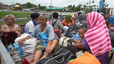 Thai residents evacuate from their homes following clashes between Thai and Cambodian soldiers in Sisaket province, Thailand. (AP) Thai residents evacuate from their homes following clashes between Thai and Cambodian soldiers in Sisaket province, Thailand. (AP)