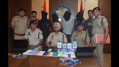 DCP Manpreet Singh Sudan addressing the media regarding the arrests in Panchkula on Friday. (Sant Arora /HT)