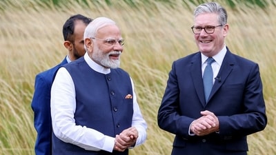 Indian Prime Minister Narendra Modi and UK Prime Minister Keir Starmer are photographed in between their conversation on Thursday. (ANI) Indian Prime Minister Narendra Modi and UK Prime Minister Keir Starmer are photographed in between their conversation on Thursday. (ANI)