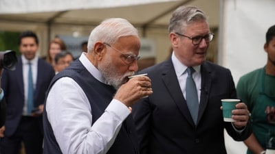 Narendra Modi and Keir Starmer sip on the beverage during a business showcase event at Chequers near Aylesbury, England. (Kin Cheung/AP) Narendra Modi and Keir Starmer sip on the beverage during a business showcase event at Chequers near Aylesbury, England. (Kin Cheung/AP)