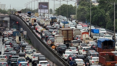 Residents were stuck on roads for hours owing to the traffic snarls caused by incessant rainfall across the financial capital. (PTI) Residents were stuck on roads for hours owing to the traffic snarls caused by incessant rainfall across the financial capital. (PTI)