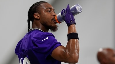 Minnesota Vikings wide receiver Justin Jefferson (18) hydrates during the team's NFL football training camp Wednesday, July 23. (AP) Minnesota Vikings wide receiver Justin Jefferson (18) hydrates during the team's NFL football training camp Wednesday, July 23. (AP)