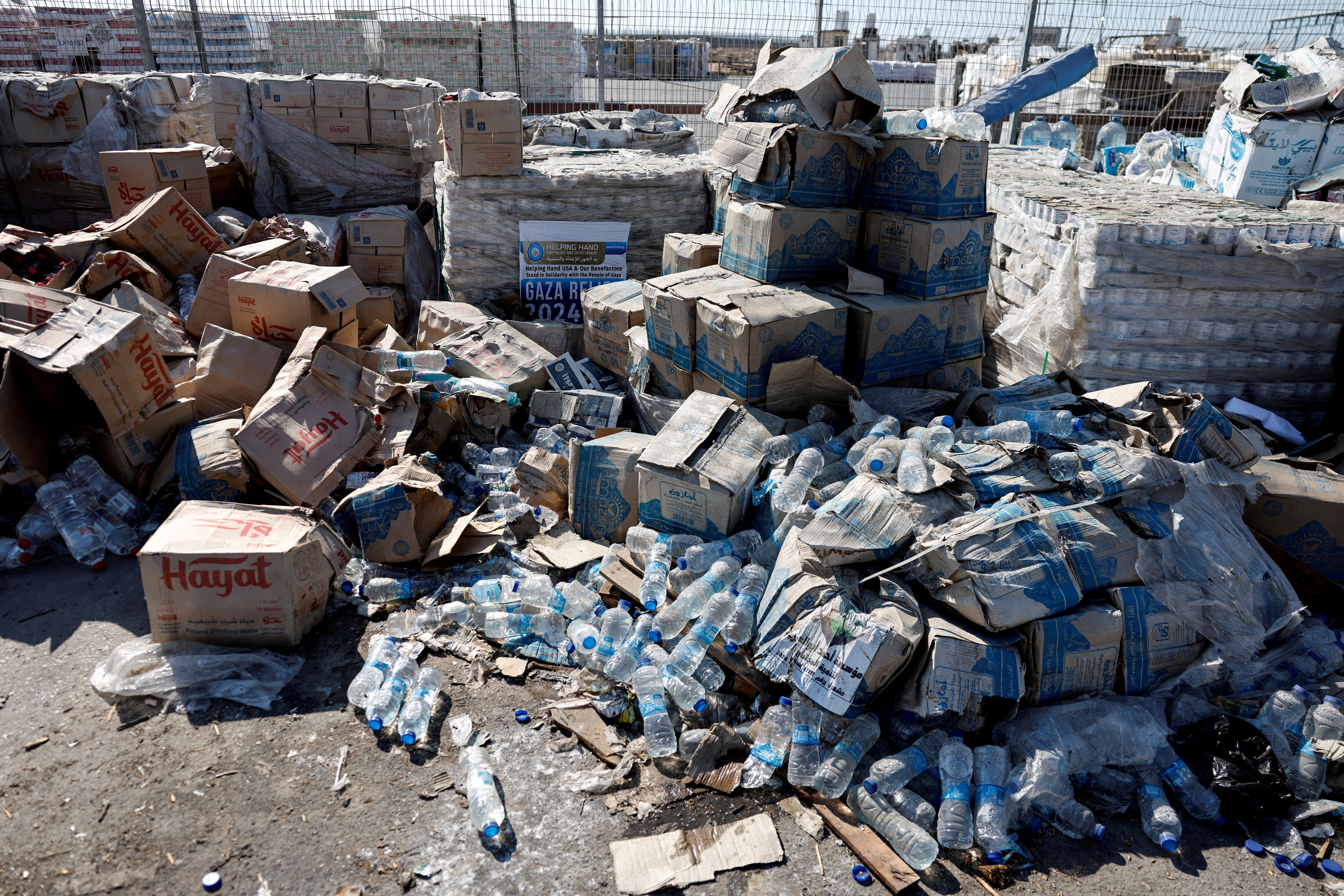 Parcels of humanitarian aid await transfer into Gaza at the Kerem Shalom crossing. (Amir Cohen/Reuters)