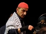 FILE PHOTO: Lebanese musician and composer Ziad Rahbani performs during a concert at the port-city of Sidon, southern Lebanon October 9, 2014. REUTERS/Ali Hashisho/File Photo