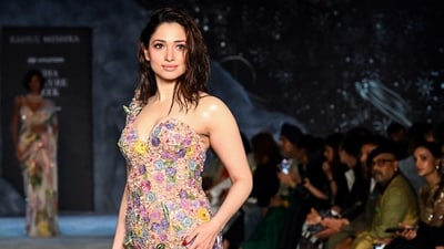 The other look was a bodycon dress with an asymmetrical shoulder strap, adorned with pastel flowers, leaves, and petals. This collection explored the stages of love. (ANI Photo/Jitender Gupta) The other look was a bodycon dress with an asymmetrical shoulder strap, adorned with pastel flowers, leaves, and petals. This collection explored the stages of love. (ANI Photo/Jitender Gupta)
