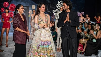 For the first show of the season, Tamannaah Bhatia walked the ramp in two looks for Rahul Mishra's Becoming Love collection. She wore a lehenga and a bodycon dress. The lehenga featured a breathtaking scenic design, with the skirt acting as a canvas depicting a lake, lotuses, birds, and lush fields. (ANI Photo/Jitender Gupta) For the first show of the season, Tamannaah Bhatia walked the ramp in two looks for Rahul Mishra's Becoming Love collection. She wore a lehenga and a bodycon dress. The lehenga featured a breathtaking scenic design, with the skirt acting as a canvas depicting a lake, lotuses, birds, and lush fields. (ANI Photo/Jitender Gupta)